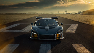 Sports car road sunset horizon - a sports car free wallpaper
