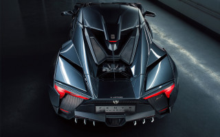 Futuristic car topview darkroom whitewall - a futuristic car free wallpaper