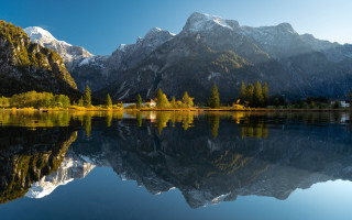 Mountain reflection lake house forest - a still lake free wallpaper