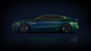 Green sports car dark room 3 - a green sports car free wallpaper