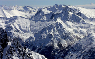 Mountain range snowy view plane - a plane window free wallpaper