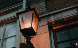 Streetlight building night person Rembrandt - a street light free wallpaper