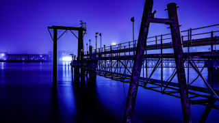 Pier purple sky light building - a building in the distance free wallpaper