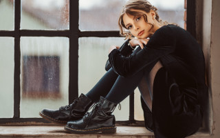 Woman sitting window sill crossed 2 - a window sill free wallpaper