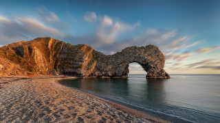 Rock formation beach sky water 2 - a sandy shore free wallpaper