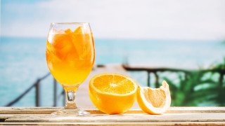 Orange juice slice ocean blurry - a view of the ocean in the background free wallpaper