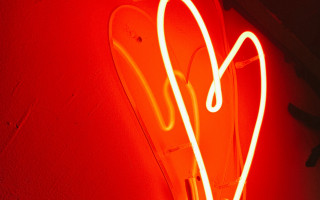 Neon heart side dark red - a red wall free wallpaper