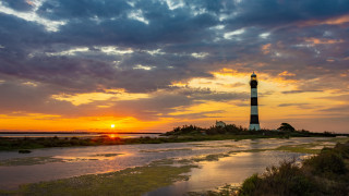 Lighthouse sunset clouds island beach - betye saar free wallpaper for desktop