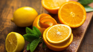 Cuttingboard sliced oranges lemons leaves - cutting free wallpaper