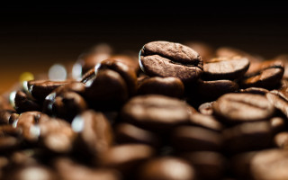 Coffee beans spoon dark background - a pile of coffee beans free wallpaper