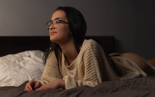 Woman bed blurry fishnets glasses - anamorphic len free wallpaper for desktop