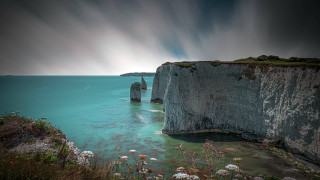 Cliff water boat mountain sky - eric deschamps free wallpaper for desktop