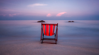 Red white chair sandy beach - a sandy beach next free wallpaper