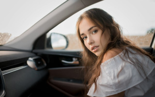 Serious woman car window brown - free vintage wallpaper