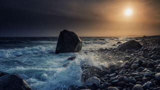 Rock sunset mountain ocean water - stormy weather free wallpaper