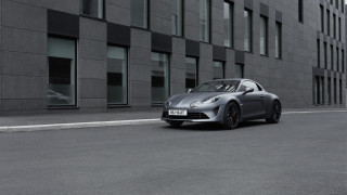 Silver sports car building black - a street free wallpaper