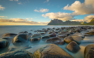 Rocky beach sunset mountains boat - the water and mountains free wallpaper