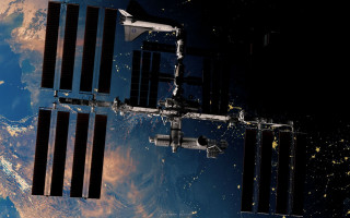 Space station earth lights satellite - a space station in the middle of the earth free wallpaper