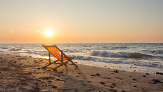 Beach chair sunset ocean sand - a beach chair free wallpaper for desktop