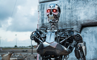 Robot red eyes cyberpunk concrete - free technology wallpaper