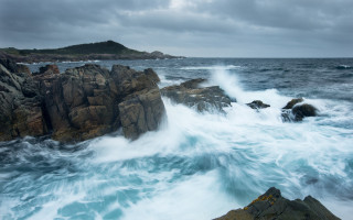 Rocky shore wave island cloudy - a small island in the distance free wallpaper