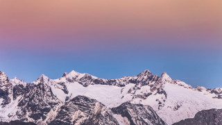 Mountain range pink sky snow 3 - a few snow covered mountains free wallpaper