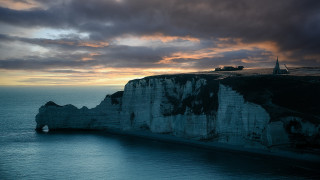 Cliff tower ocean cloudy sky - a tower free wallpaper