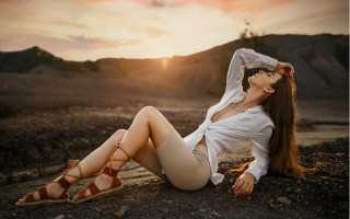 Woman lying beach sunset fashion - tan free wallpaper