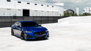 Blue car parking lot vroom - a black fence free wallpaper