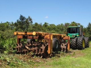 Tractor parked field plow attached - a tractor free wallpaper