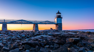 Lighthouse rocky shore bridge sunset 2 - a rocky shore free wallpaper for desktop