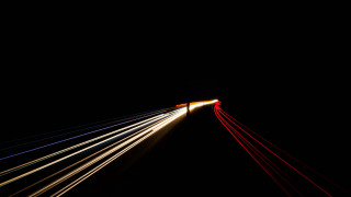Long exposure car tunnel light - free new year wallpaper