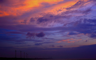 Sunset clouds windmills cityscape ocean - colorful cloud free wallpaper