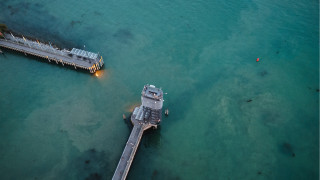 Pier boat light ecological art - aerial view free wallpaper