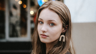 Woman longhair earrings serious look - chernik free wallpaper for desktop