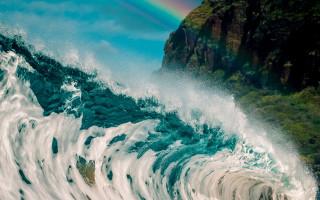 Rainbow over ocean wave mountain - in the ocean free wallpaper