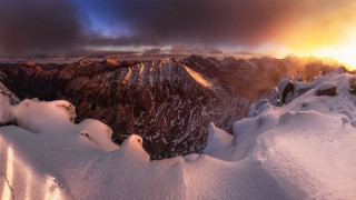 Snowy mountain range sunset cloudy - the cloud and the sun free wallpaper