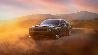 Black car desert mountain sunset - a dirt road in the desert free wallpaper for desktop