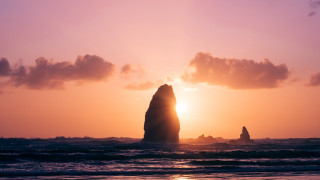 Large rock ocean sunset clouds - a large rock free wallpaper