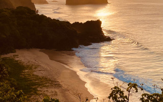 Beach rock formation water foreground - a few wave free wallpaper