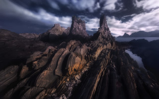 Mountain lake clouds stars night - a rocky cliff free wallpaper