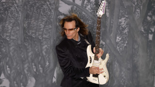 Black suit man white guitar - a black suit holding free wallpaper
