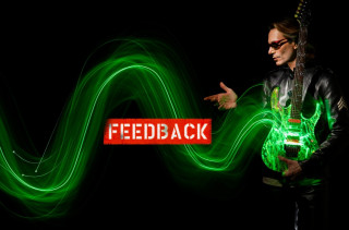 Man holding guitar pointing feedback - interactive free wallpaper for desktop