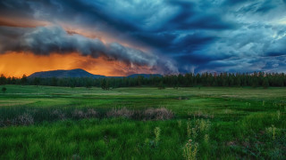 Mountain field forest sunset clouds - stormy weather free wallpaper