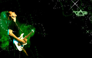 Guitarist darkroom stars green triangle - a man playing free wallpaper