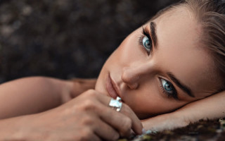 Woman laying blue eyes ring 2 - her finger free wallpaper for desktop