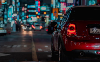 Red car night street tilt - rim free wallpaper