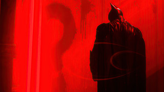 Batman man red wall question - a man in a batman costume free wallpaper
