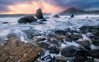 Rocky beach sunset mountains planet - rich moody colour free wallpaper