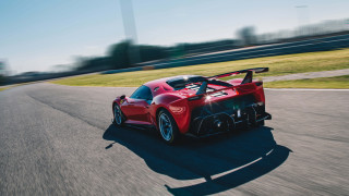 Red sports car race track 17 - a sky background and grass free wallpaper